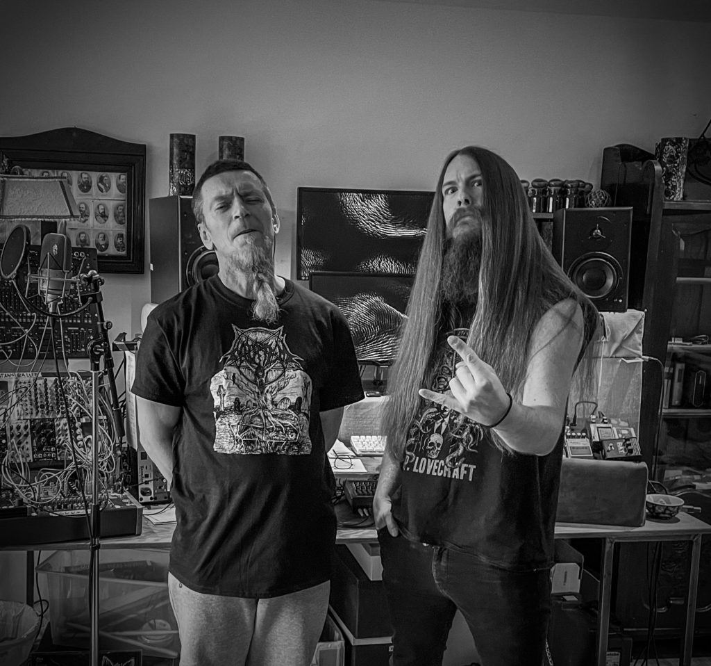 Snorre Ruch (Thorns) and Thomas Eriksen (Mork) posing very metal-like in front of music studio gear.